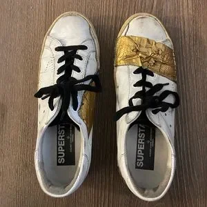 Golden goose taped sneakers hot sale